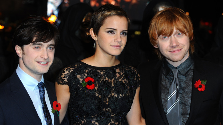 Daniel Radcliffe, Emma Watson and Rupert Grint pose together