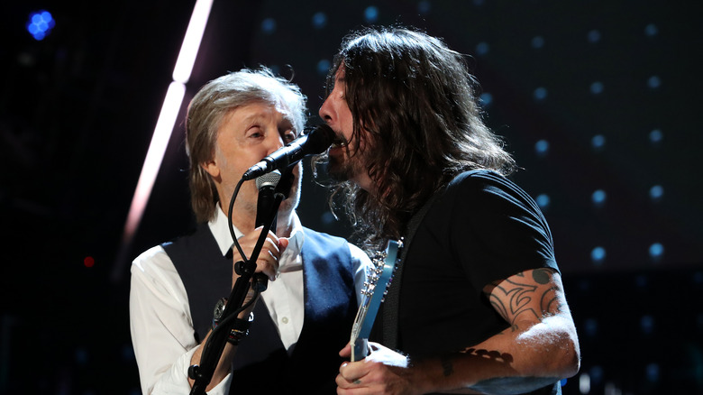 Paul McCartney and Dave Grohl performing