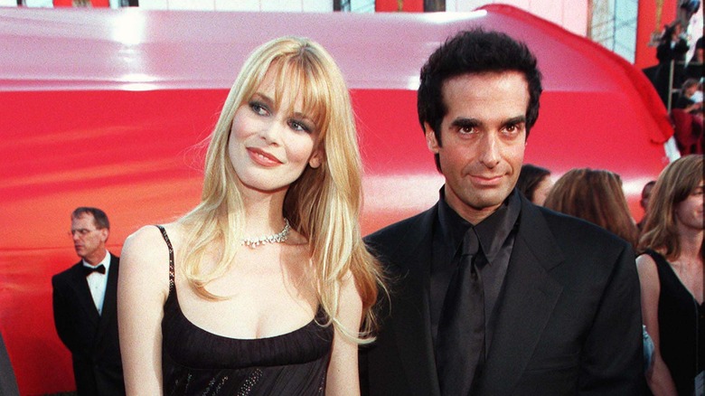 David Copperfield and Claudia Schiffer smiling slightly