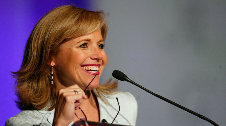 Katie couric speaking to a crowd