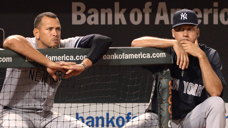 Derek Jeter and Alex Rodriguez looking