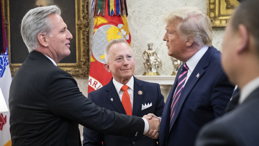 Kevin McCarthy and Donald Trump shaking hands