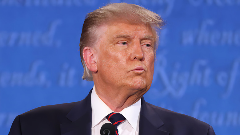 Donald Trump with a neutral expression