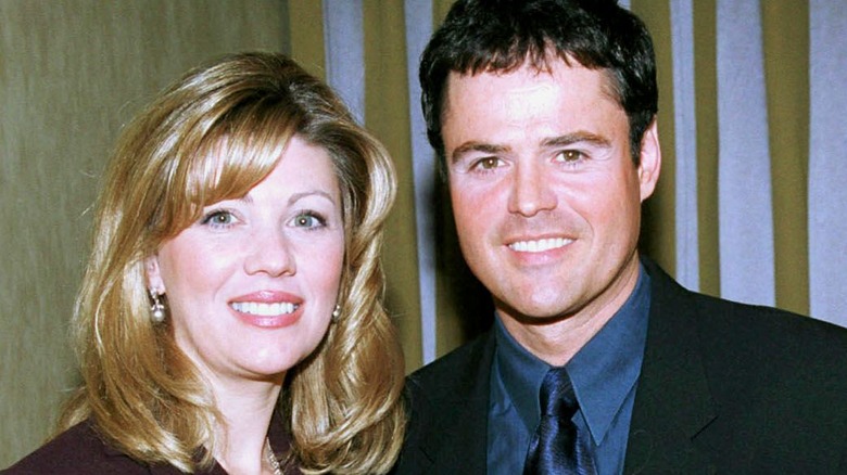 Donny Osmond with wife Debbie Osmond smiling