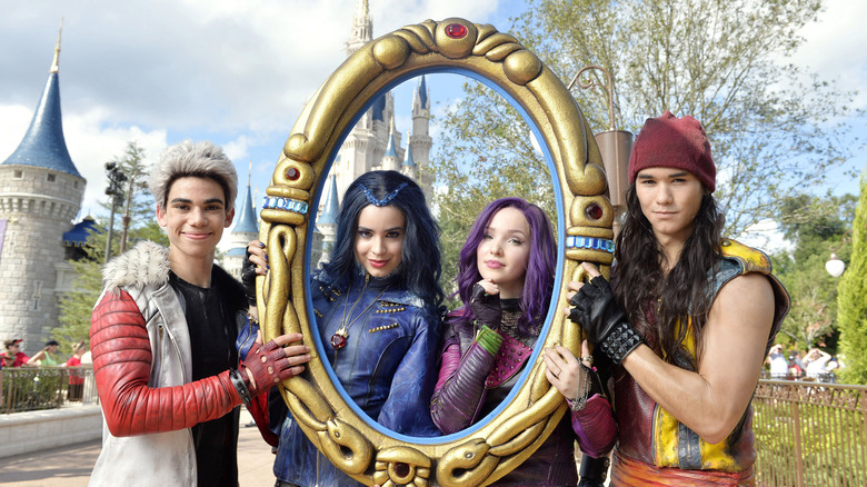 "The Descendants" stars pose together in costume 2015