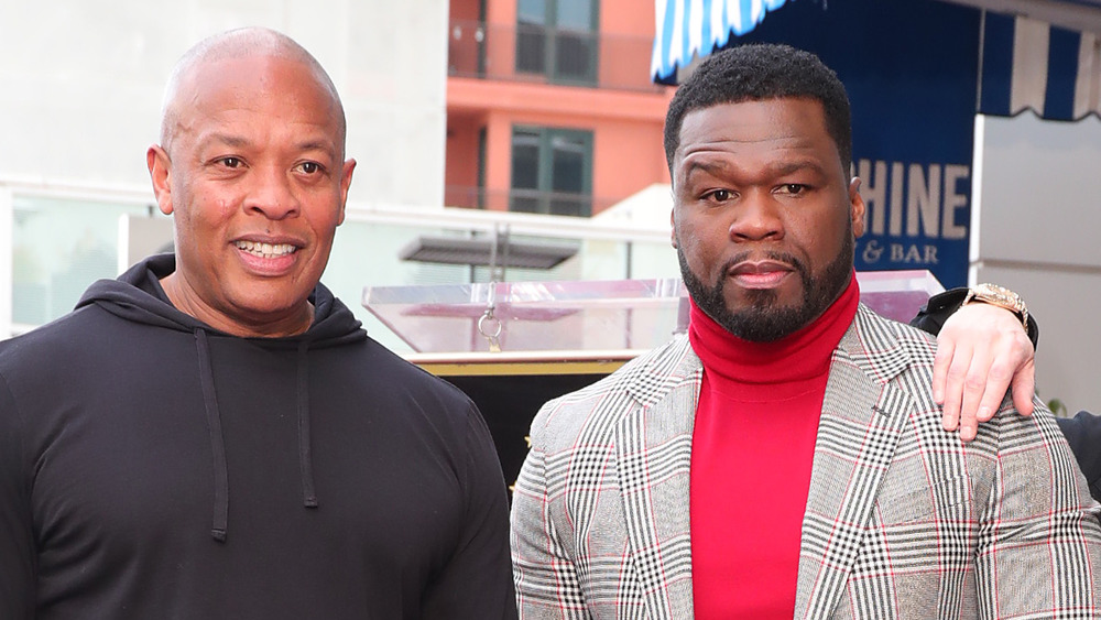 Dr. Dre and 50 Cent smile at 50 Cent's Hollywood Walk of Fame ceremony