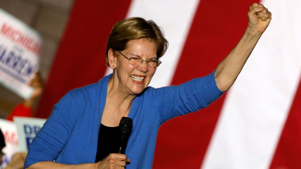 Massachusetts Senator Elizabeth Warren gestures as she speaks during a campaign rally at Eastern Market in Detroit, Michigan