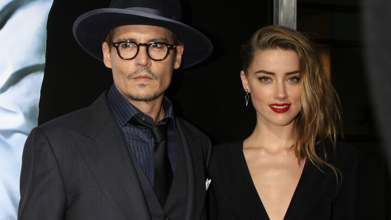 Johnny Depp and Amber Heard smiling together