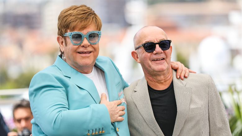 The Truth About Elton John's Songwriting Partner Bernie Taupin