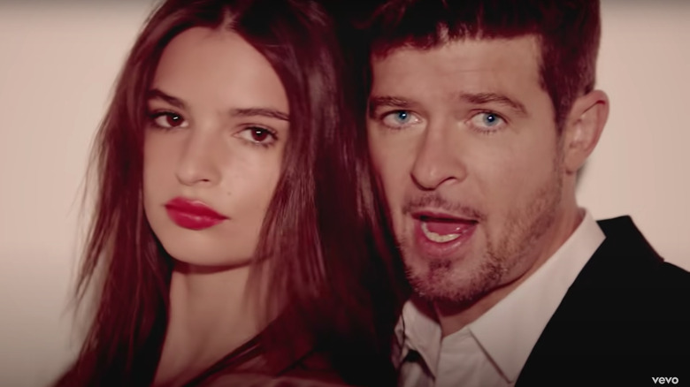Emily Ratajkowski and Robin Thicke in the 'Blurred Lines' music video