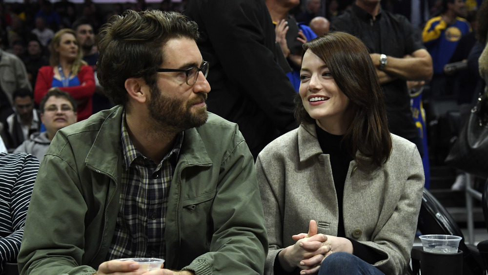 Emma Stone and Dave McCary at a sports event