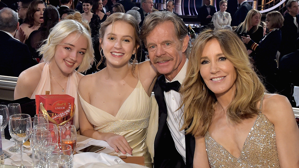 Felicity Huffman, Sophia Macy, Georgia Macy, and William H. Macy posing together at an event