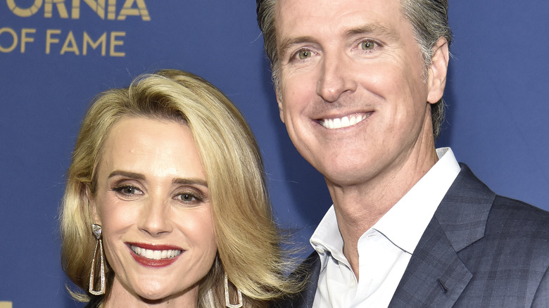 Jennifer Siebel and Gavin Newsom smiling 