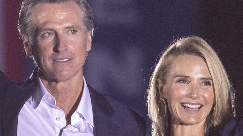 Gavin Newsom and Jennifer Siebel campaigning on stage