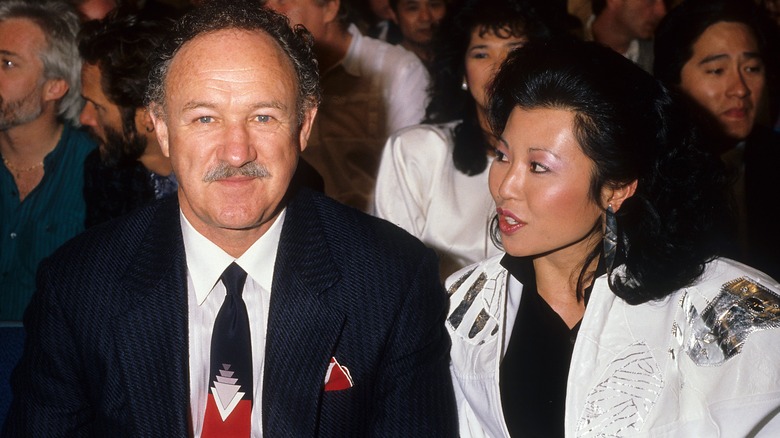 Gene Hackman and Betsy Arakawa sitting together