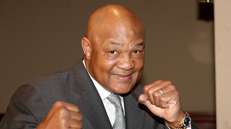 George Foreman smiling fists up