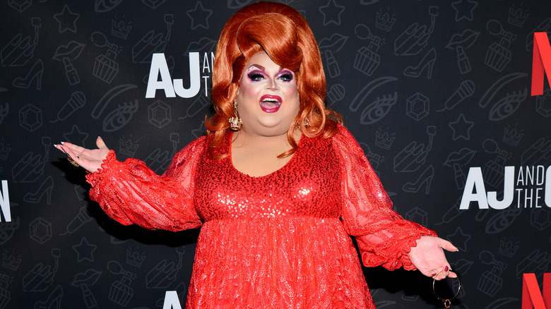 Ginger Minj red dress arms out