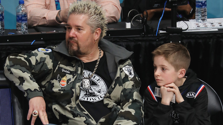 Guy Fieri and his son Ryder at a basketball game