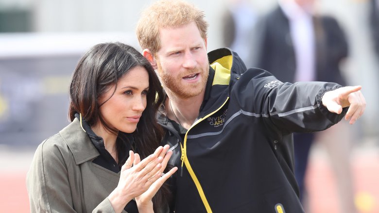 Meghan Markle and Prince Harry looking off-camera