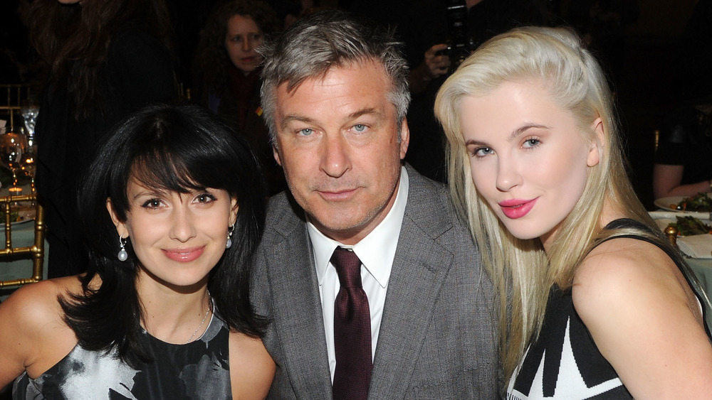 Hilaria Baldwin, Alec Baldwin, and Ireland Baldwin pose together