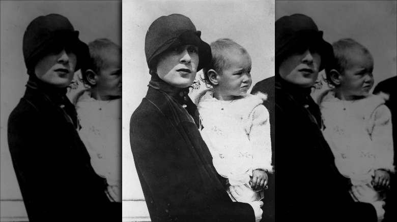 A baby Gloria Vanderbilt with her mother in 1926
