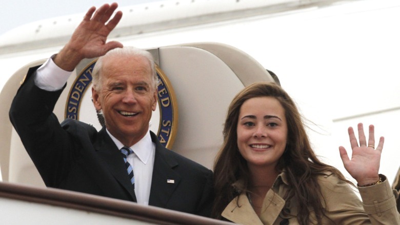 Joe Biden and Naomi Biden waving