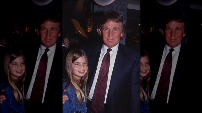 A young Ivanka Trump smiling with her father, Donald Trump