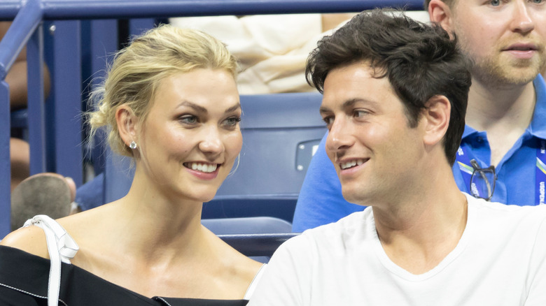 Karlie Kloss and Josh Kushner at an event 