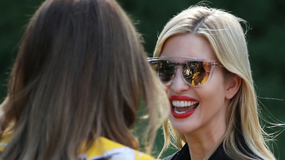 Melania Trump, Ivanka Trump smiling at each other