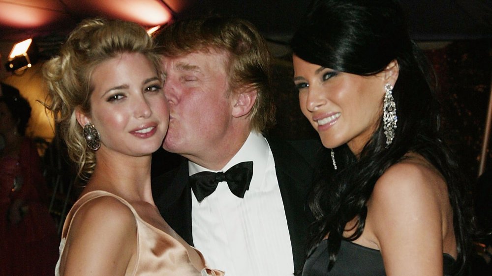 Ivanka Trump, Donald Trump, Melania Trump at a party in 2004