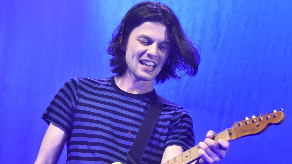 James Bay playing guitar