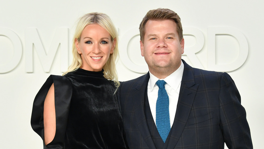 Julia Carey posing with husband James Corden