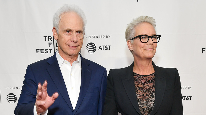 Christopher Guest and Jamie Lee Curtis posing together on the red carpet