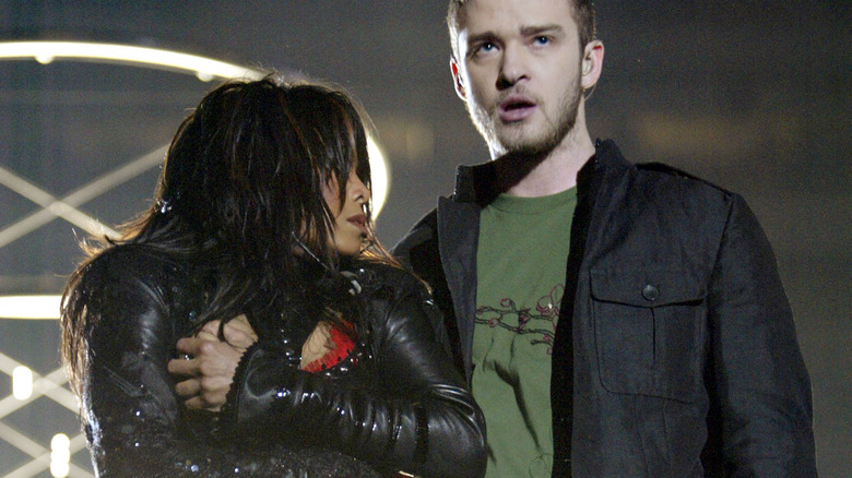 Janet Jackson clutching chest beside Justin Timberlake