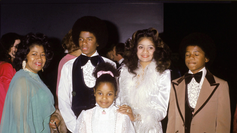 Young Janet Jackson with family, posing