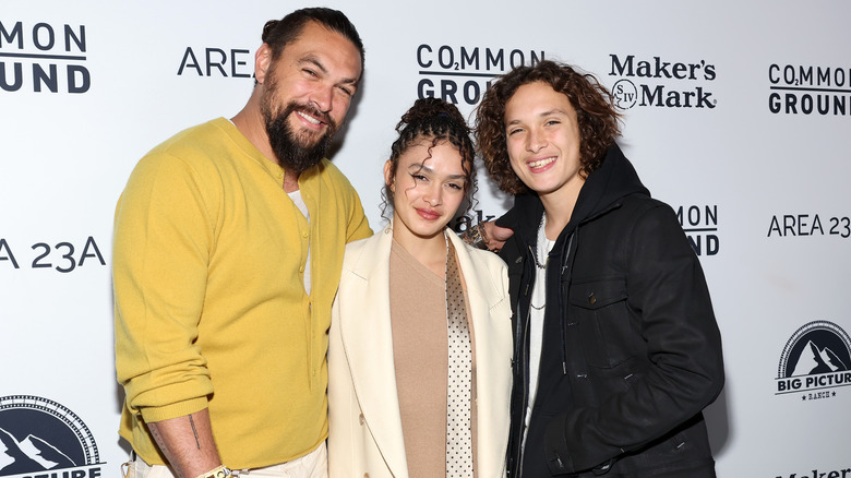 Jason Momoa, posing with Lola and Nakoa-Wolf