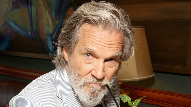 Jeff Bridges sipping a drink