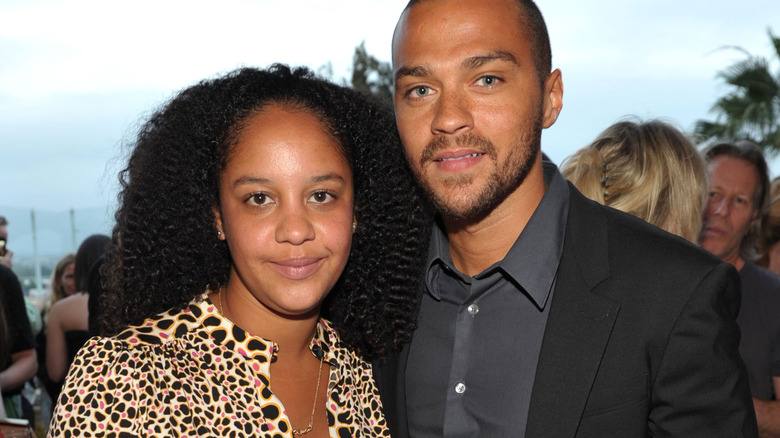 Aryn Drake-Lee smiles alongside Jesse Williams at an event