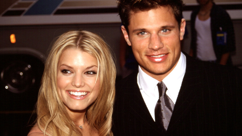 Jessica Simpson and Nick Lachey smile