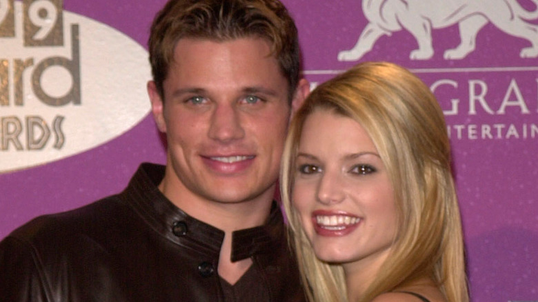 Jessica Simpson and Nick Lachey smile