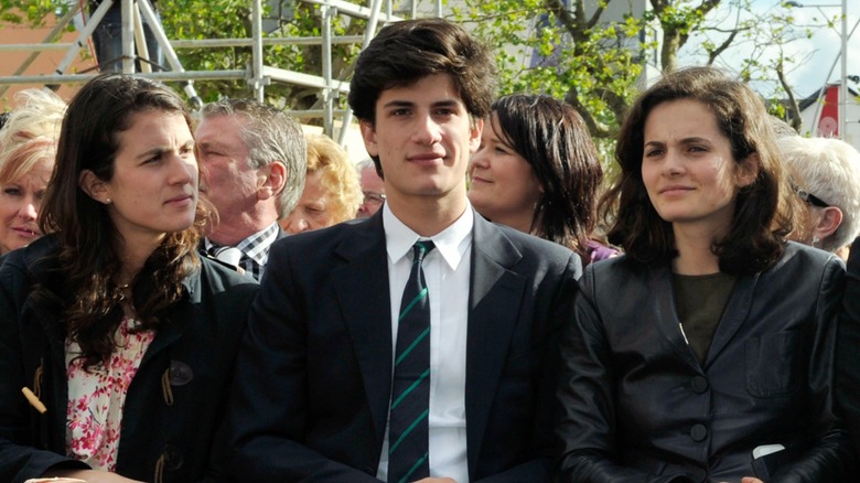 Rose, Tatiana, and Josh Kennedy Schlossberg sitting