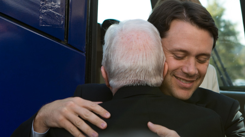 Jason Carter hugging Jimmy Carter