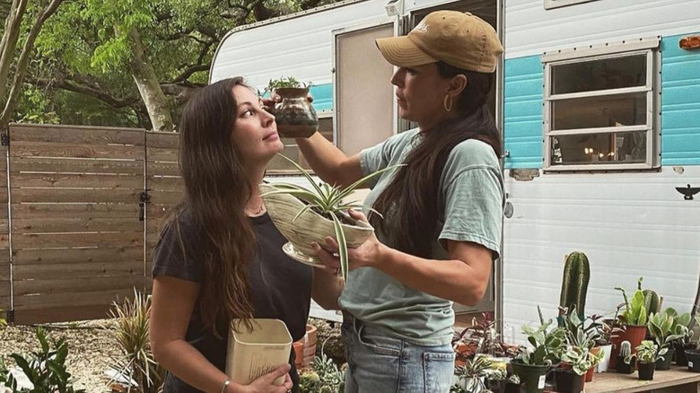 Joanna Gaines and sister Mikey McCall pose 