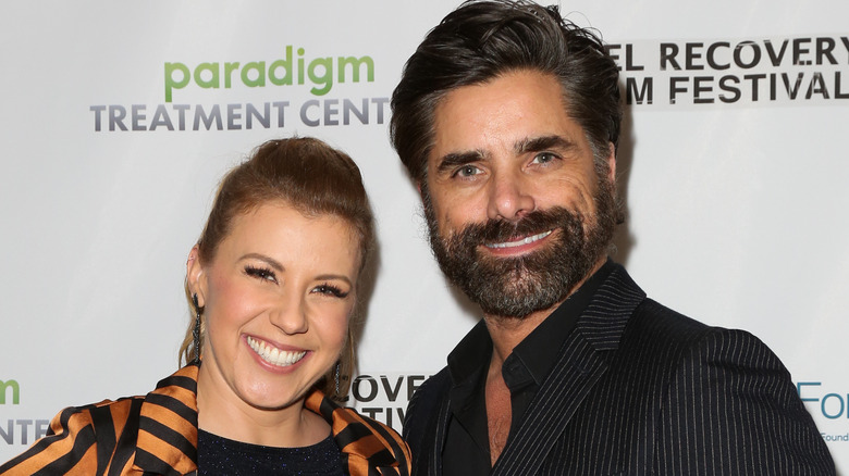 Jodie Sweetin and John Stamos smiling