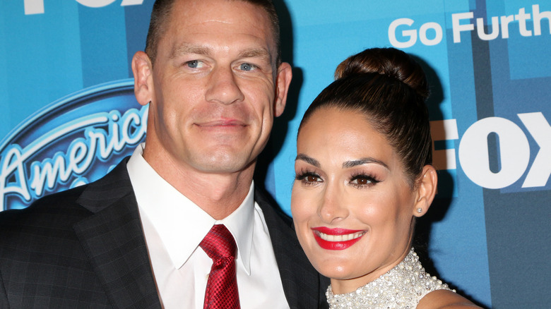 John Cena, Nikki Bella pose for the press