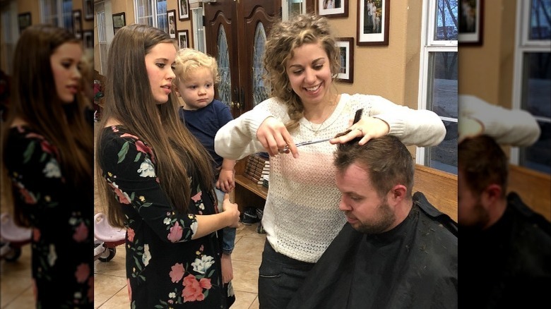Abbie Duggar cutting husband's hair