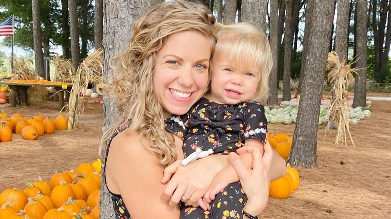 Abbie Duggar holding daughter Grace