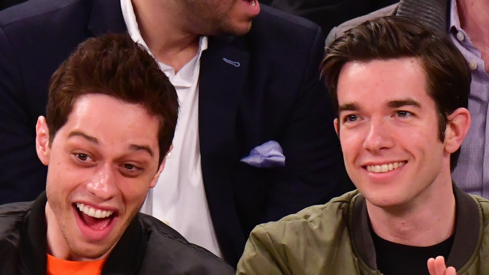 Pete Davidson and John Mulaney laughing