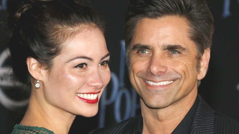 Caitlin Mchugh and John Stamos at the World premiere of Disney's 'Mary Poppins Returns' 2018 