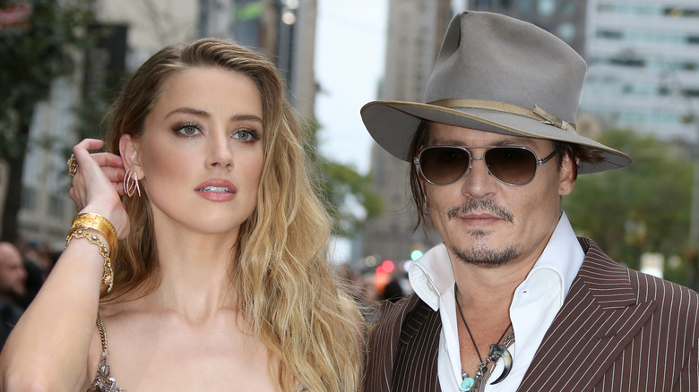 Johnny Depp and Amber Heard at an event 